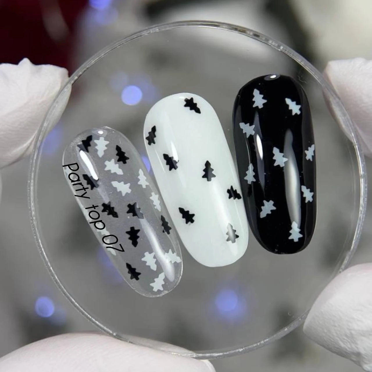 NAILSOFTHEDAY Party Top 07 — a glossy no-wipe top coat with black and white tree-shaped holographic glitter, 10 ml.