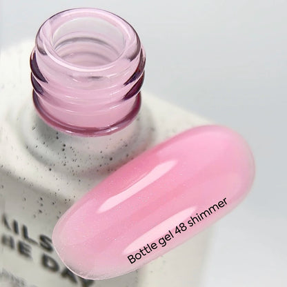 NAILSOFTHEDAY Bottle Gel 48 Shimmer — gel ultra-résistant rose avec shimmer argenté pour le renforcement des ongles, 10 ml