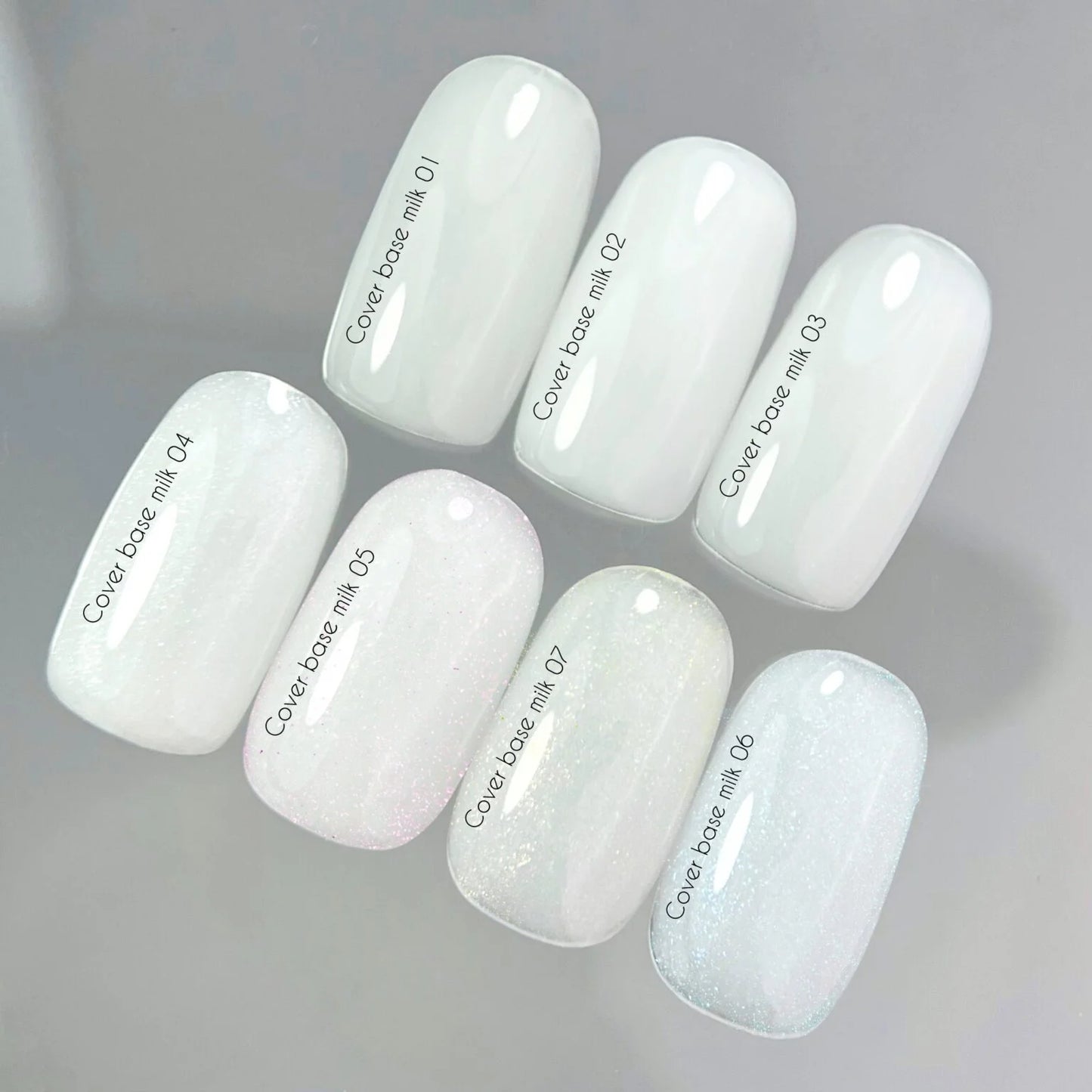 Nailsoftheday Cover base NEW Formula milk 05 — молочне, напівпрозоре з рожевим шимером, який підсилює відтінок та робить його більш теплим, камуфлююче базове покриття для нігтів, 10 мл