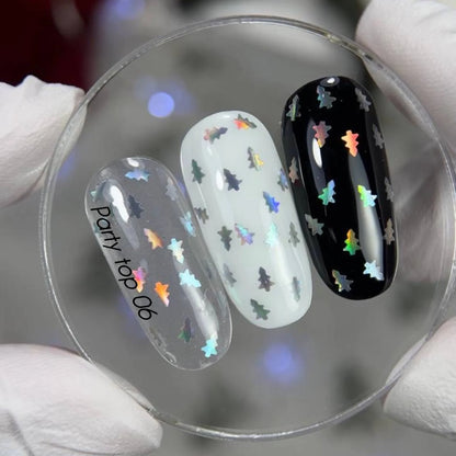 NAILSOFTHEDAY Party Top 06 — a holographic top coat with festive tree-shaped glitter, no sticky layer, 10 ml.